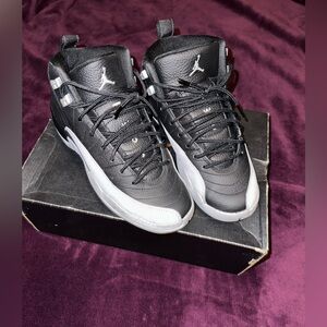 Very great condition…..Jordan Kids Sneakers Black and White